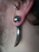 stretched ear lobe with ball claw